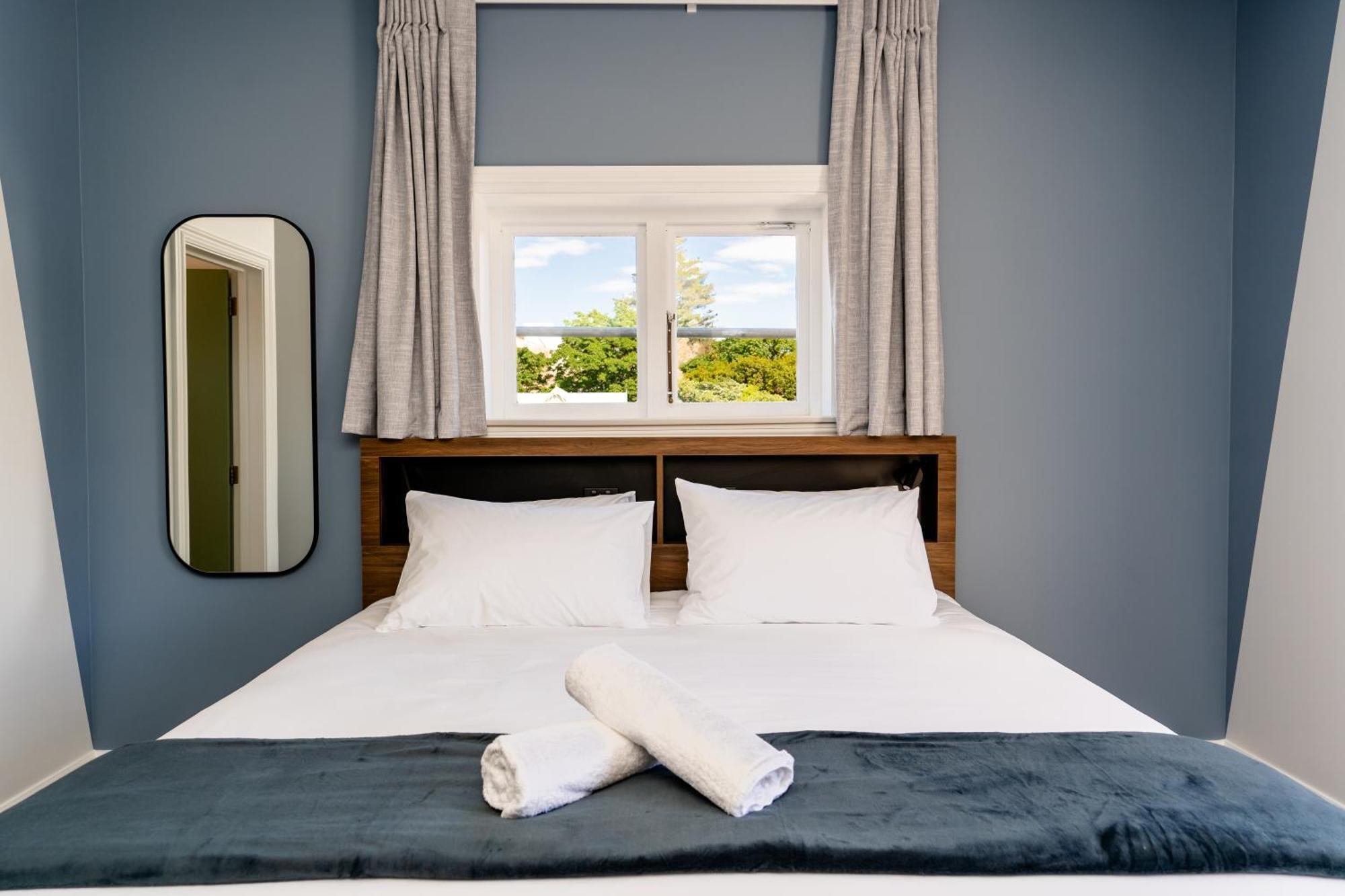 Haka House Christchurch Exterior foto A bedroom at the hotel