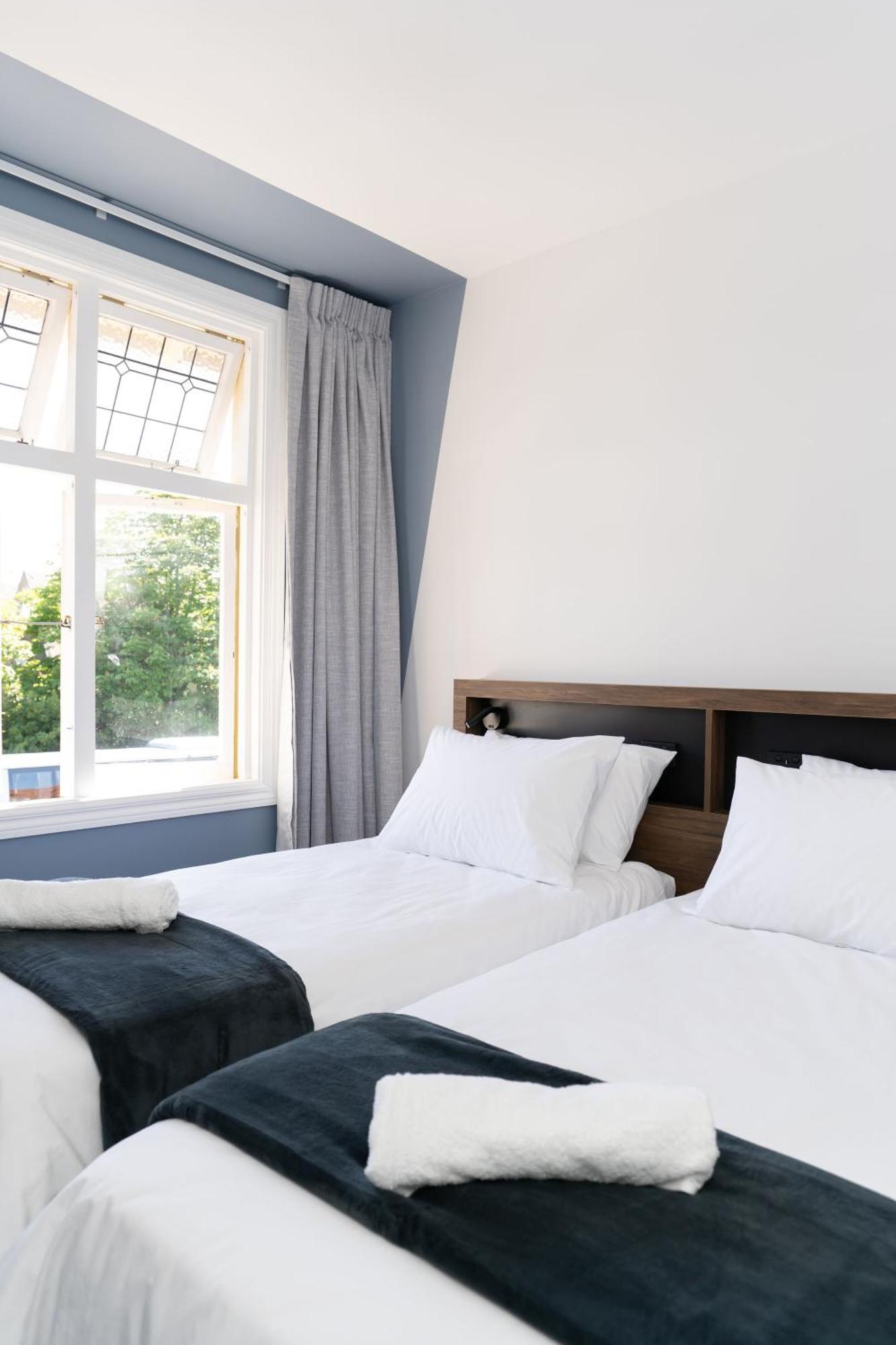 Haka House Christchurch Exterior foto A bedroom at the hotel
